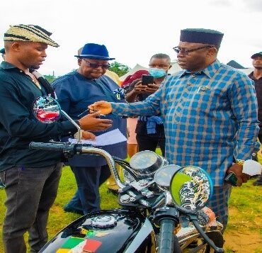 Presentation of Motorcycle to a beneficiary of Mbo